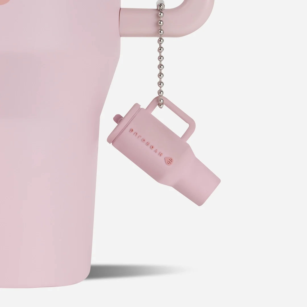 traveler-keychain-u0 Web-TravelerKeychainPhotos-PinkSand2.webp